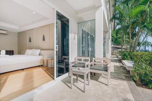 Postel nebo postele na pokoji v ubytování Combo Beach Hotel Samui + 162 fotografií