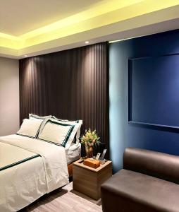 Ένα ή περισσότερα κρεβάτια σε δωμάτιο στο Thebed's Rojana