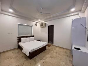 Ένα ή περισσότερα κρεβάτια σε δωμάτιο στο Urban Nest