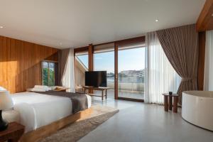 Μια τηλεόραση ή/και κέντρο ψυχαγωγίας στο BAAT Boutique Hotel - บาตร บูทีคโฮเทล อยุธยา