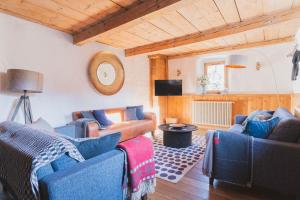 Et opholdsområde på La Ferme a Mamy - Snowytrees