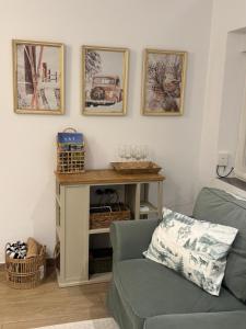 a living room with a table and a couch at Apartamento La Sabina in Reinosa