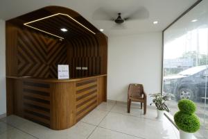 Vstupní hala nebo recepce v ubytování Staymax Parassinikadavu