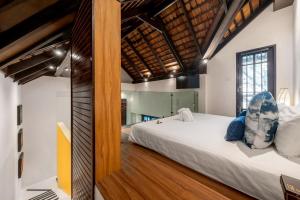 a bedroom with a large bed in a room at Kirikayan Boutique Resort - SHA Extra Plus in Chaweng +88 photos