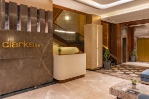 a lobby of a hotel with a reception desk at Clarks Inn Kharar-Mohali in Kharar