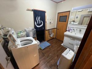 Koupelna v ubytování Hermit 知床 + 57 fotografií