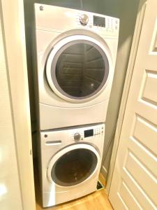 a washer and dryer in a room at The Deep Ellum Serenity Suite in Dallas