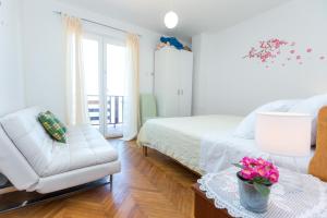 Ένα ή περισσότερα κρεβάτια σε δωμάτιο στο Apartment Ivo