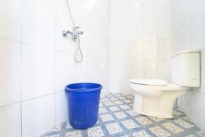 Ένα μπάνιο στο Berkah Guest House Prambanan By ARBA