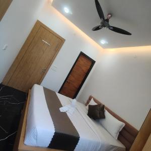 En eller flere senge i et værelse på Kasaara Retreat By Nexottel