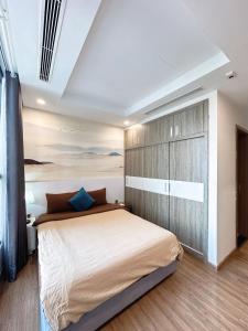 Ένα ή περισσότερα κρεβάτια σε δωμάτιο στο Jolie Apartment Vinhomes Green Bay +53 φωτογραφίες