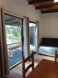 Ένα ή περισσότερα κρεβάτια σε δωμάτιο στο AIRES DEL BOSQUE Con JACUZZI