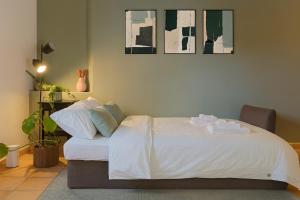 Postel nebo postele na pokoji v ubytování Lippi's House in Piazza Duomo