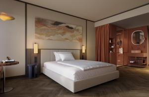 Postel nebo postele na pokoji v ubytování Hotel Schani City