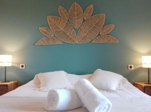 Ένα ή περισσότερα κρεβάτια σε δωμάτιο στο Domaine des Granges