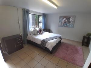 Giường trong phòng chung tại Mountain Vue