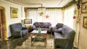 a living room with two couches and a coffee table at Villagalicia360 in Bergondo