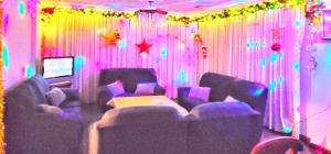 a room with chairs and a table and lights at Villagalicia360 in Bergondo