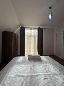 Postel nebo postele na pokoji v ubytování Lagusheda + 18 fotografií