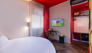 TV/trung tâm giải trí tại Scarlet Hotel