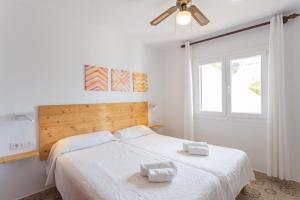 En eller flere senge i et værelse på V60A Villa Lucia