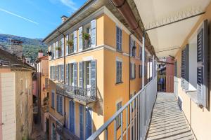 an alley in an old town with buildings at Piazza Mercato14 in Domodossola