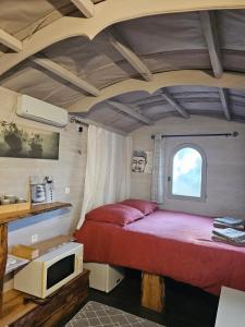 Postel nebo postele na pokoji v ubytování Les Chouchous du Garthieu