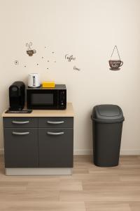 Kuchyň nebo kuchyňský kout v ubytování Séjourner chez Roto