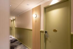 Ένα μπάνιο στο Logis Hôtel du Haut-Bugey