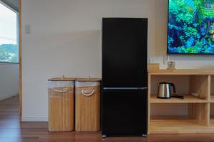 Kuchyň nebo kuchyňský kout v ubytování Beppu Ohana