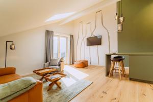 TV/trung tâm giải trí tại KABINETT Boutique Apartments