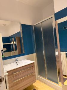 a bathroom with a sink and a shower at Leonardo rooms in Avellino