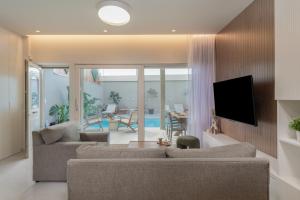 Et tv og/eller underholdning på Elysian Residences Heraklion