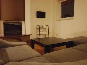 Et opholdsområde på Apartament z Jacuzzi