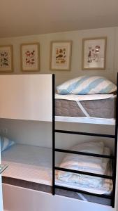 Ένα ή περισσότερα κρεβάτια σε δωμάτιο στο Ty Fret - vue mer +14 φωτογραφίες