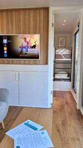 Ένα ή περισσότερα κρεβάτια σε δωμάτιο στο Ty Fret - vue mer