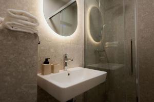 Ένα μπάνιο στο Lebenski Residence Tatras Exclusive Apartment +39 φωτογραφίες