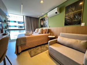 Χώρος καθιστικού στο Setai Aquamaris Premium 3pessoas Vista Mar Lateral