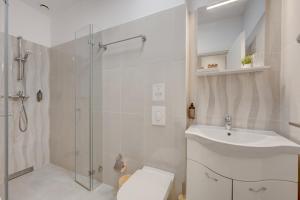 Et badeværelse på L'Heritage Collection Romana Apartments + 46 billeder