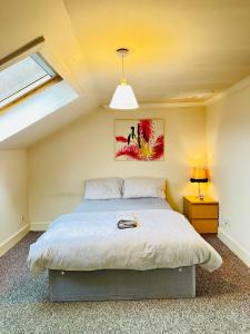 Postel nebo postele na pokoji v ubytování Central Retreat on Sauchiehall Street