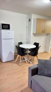 Η κουζίνα ή μικρή κουζίνα στο Cosy 7 - Belfort centre