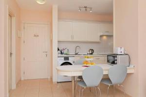 Køkken eller tekøkken på Céntrico apartamento primera linea del mar