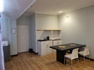 Kuchyň nebo kuchyňský kout v ubytování Farmlands Guesthouse