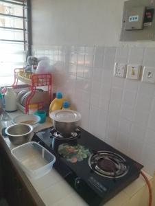 Køkken eller tekøkken på Casuarina Cosy Home