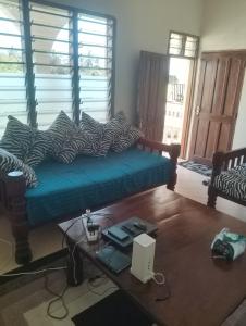 Et opholdsområde på Casuarina Cosy Home