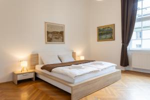 En eller flere senge i et værelse på Urban Rooms--free parking-- + 16 billeder