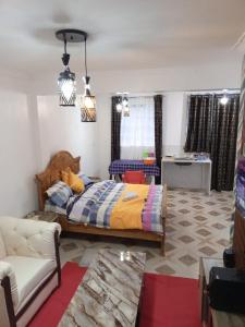 Ένα ή περισσότερα κρεβάτια σε δωμάτιο στο Julli Villas