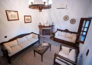 Et opholdsområde på Kitta Towerhouse - Mani Sunset Views + 33 billeder