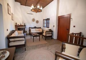 Et opholdsområde på Kitta Towerhouse - Mani Sunset Views