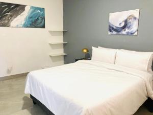 Postel nebo postele na pokoji v ubytování Gordon's Bay Mountain and Seaview